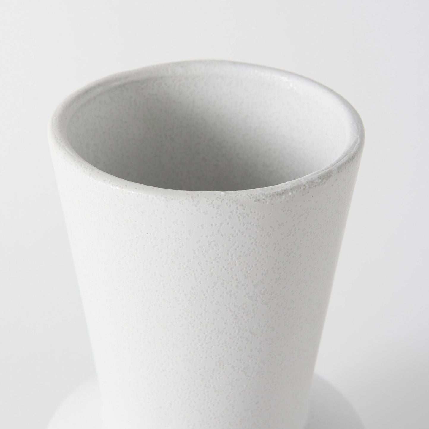 White decorative ceramic vase alternative angle showing versatile modern home decor piece