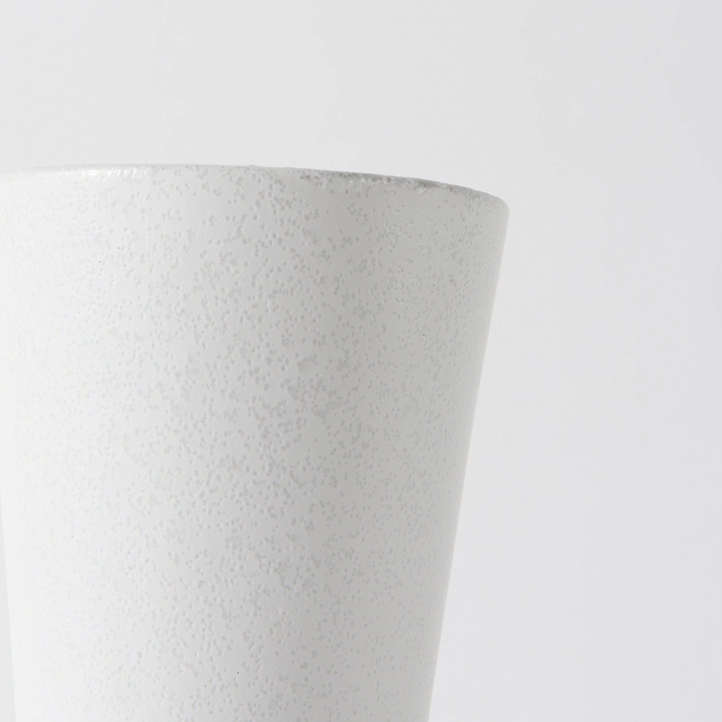 White ceramic vase full view demonstrating 9 inch height ideal for small to medium arrangements