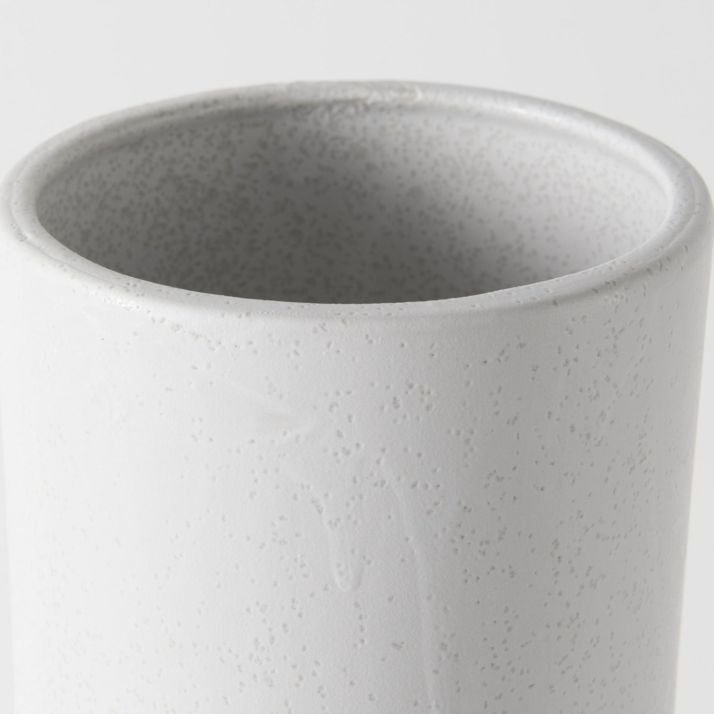 White decorative ceramic vase alternative angle showing versatile modern home decor piece