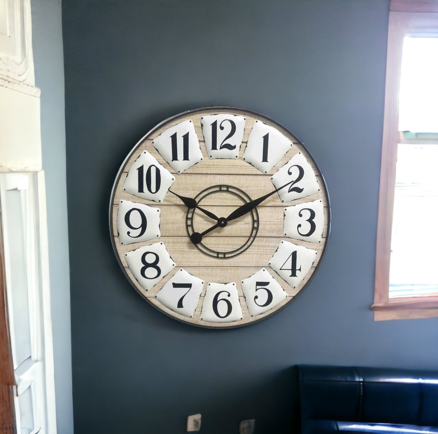 Rustic wooden wall clock mounted on dark wall in modern interior setting
