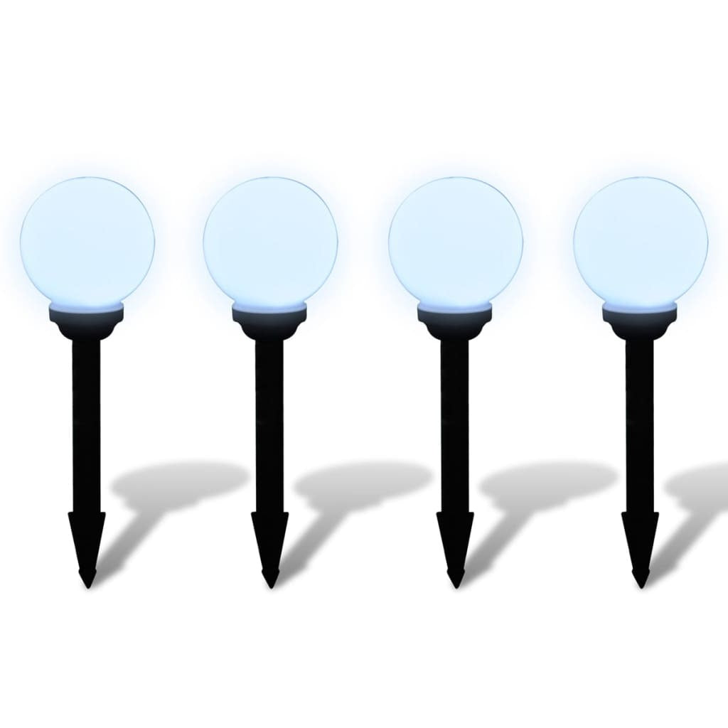 White solar-powered garden lights with adjustable height tubes and ground spikes for pathway installation