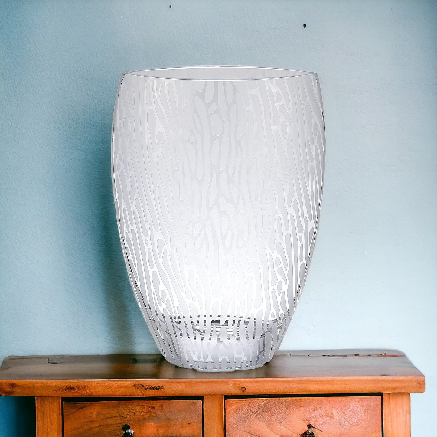 Abstract oval crystal vase detail view showing clear and frosted glass combination, premium quality modern decor