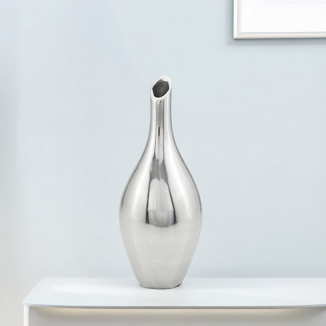 Silver aluminum bud vase showing unique shape and lustrous finish, 16 inch modern metal decoration