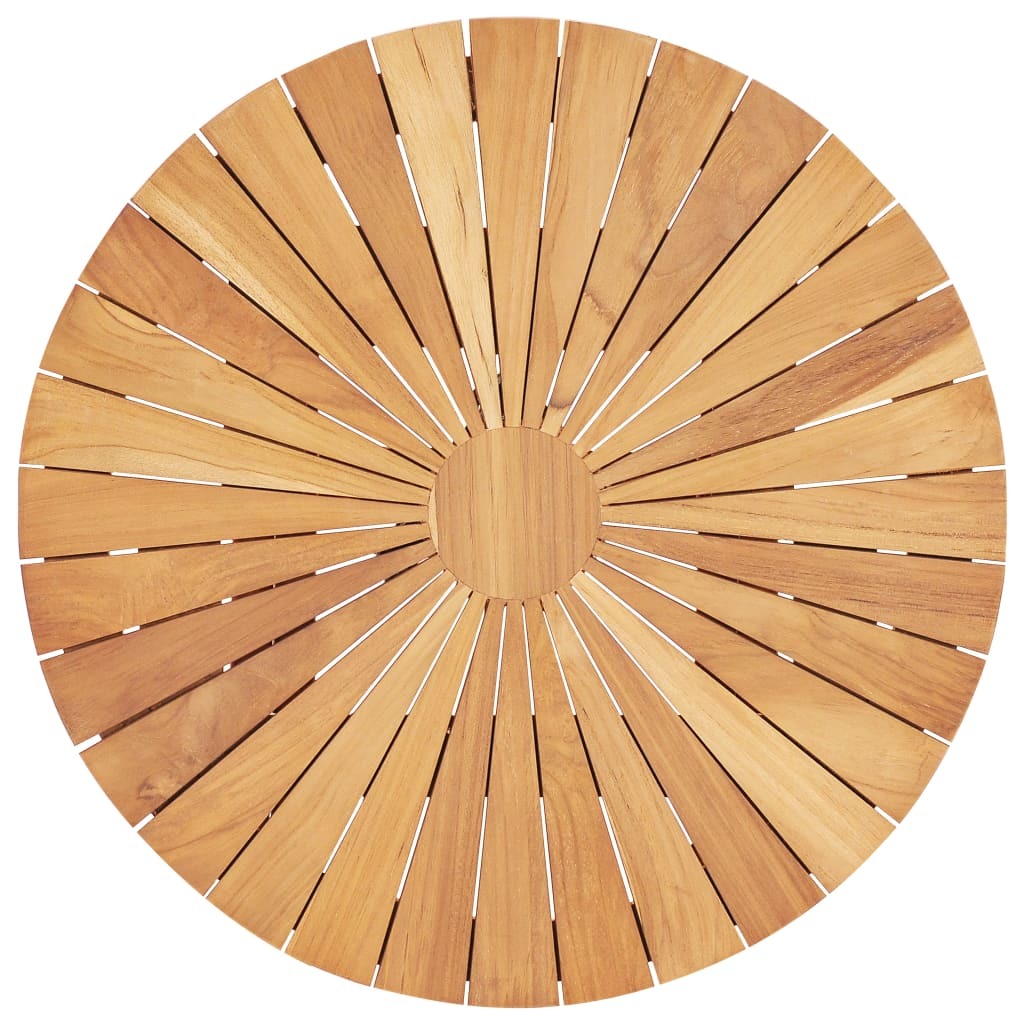 Top view of round teak table surface showing natural wood grain pattern