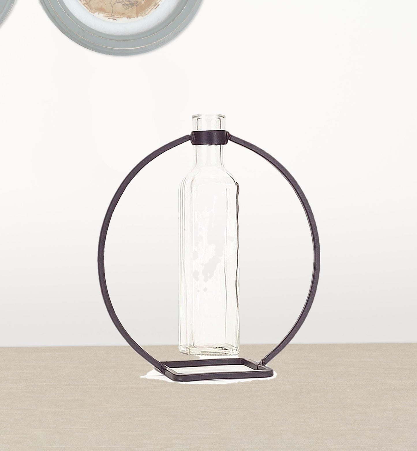 Side view of contemporary round metal wall vases in gray showing 9 inch height perfect for fresh flowers and greenery