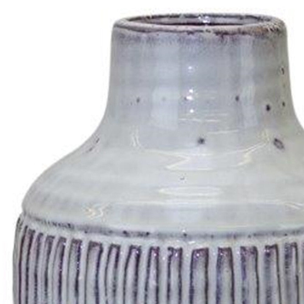 White and brown terracotta vase detail showing premium craftsmanship and textured ribbed design