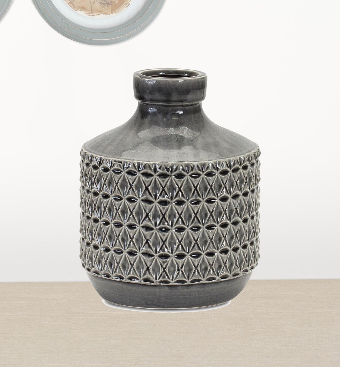 Modern minimalist gray vase showing geometric texture and matte finish, perfect for single stem flowers