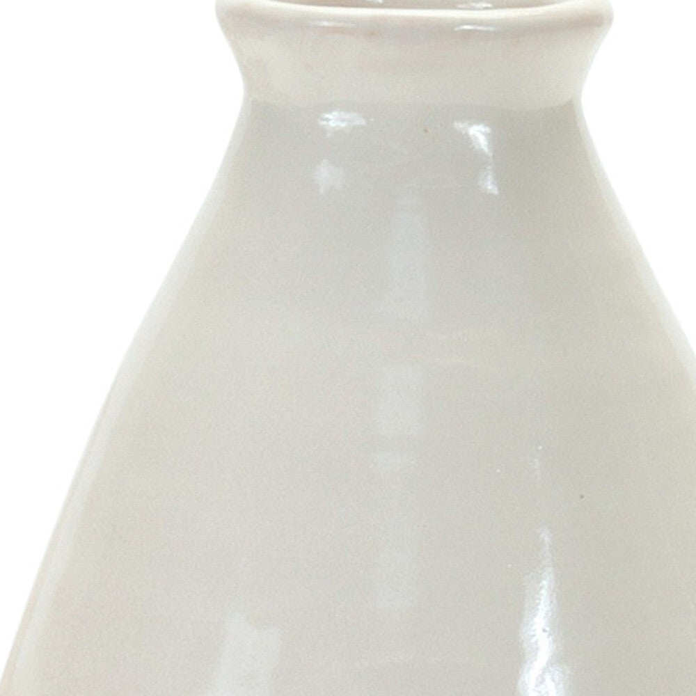 White ceramic bud vases pair side view demonstrating stable base and elegant proportions