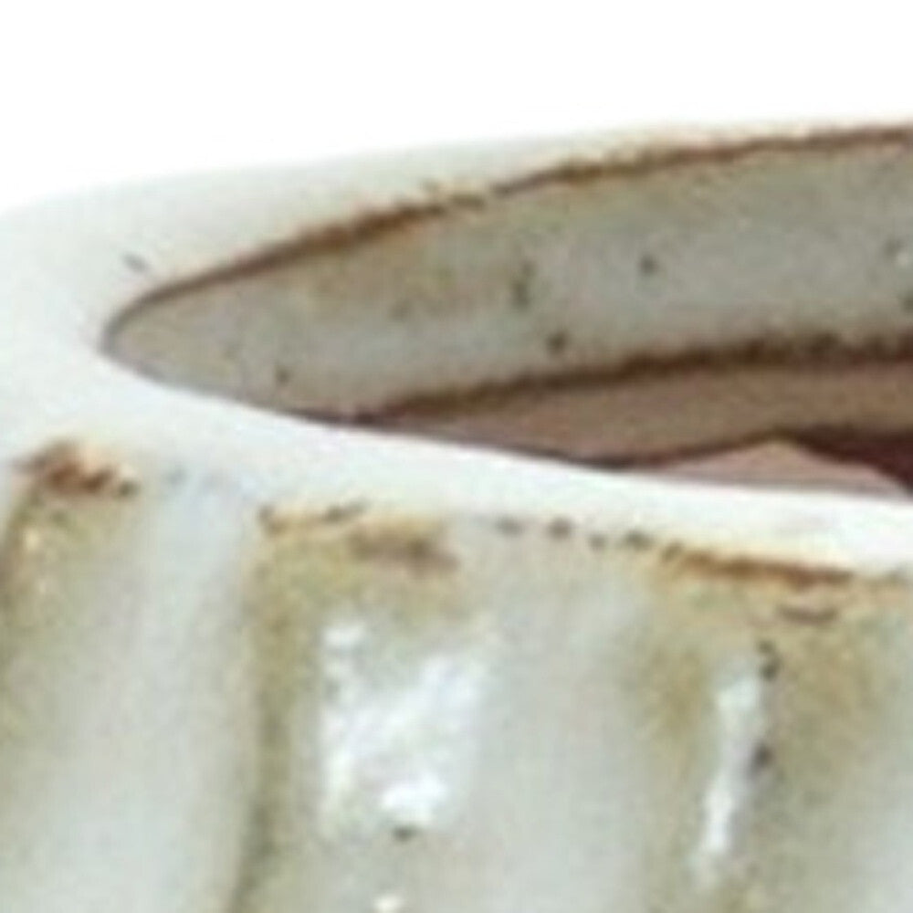 Contemporary ivory vase showing ribbed texture and elegant finish, 6 inch modern home accent