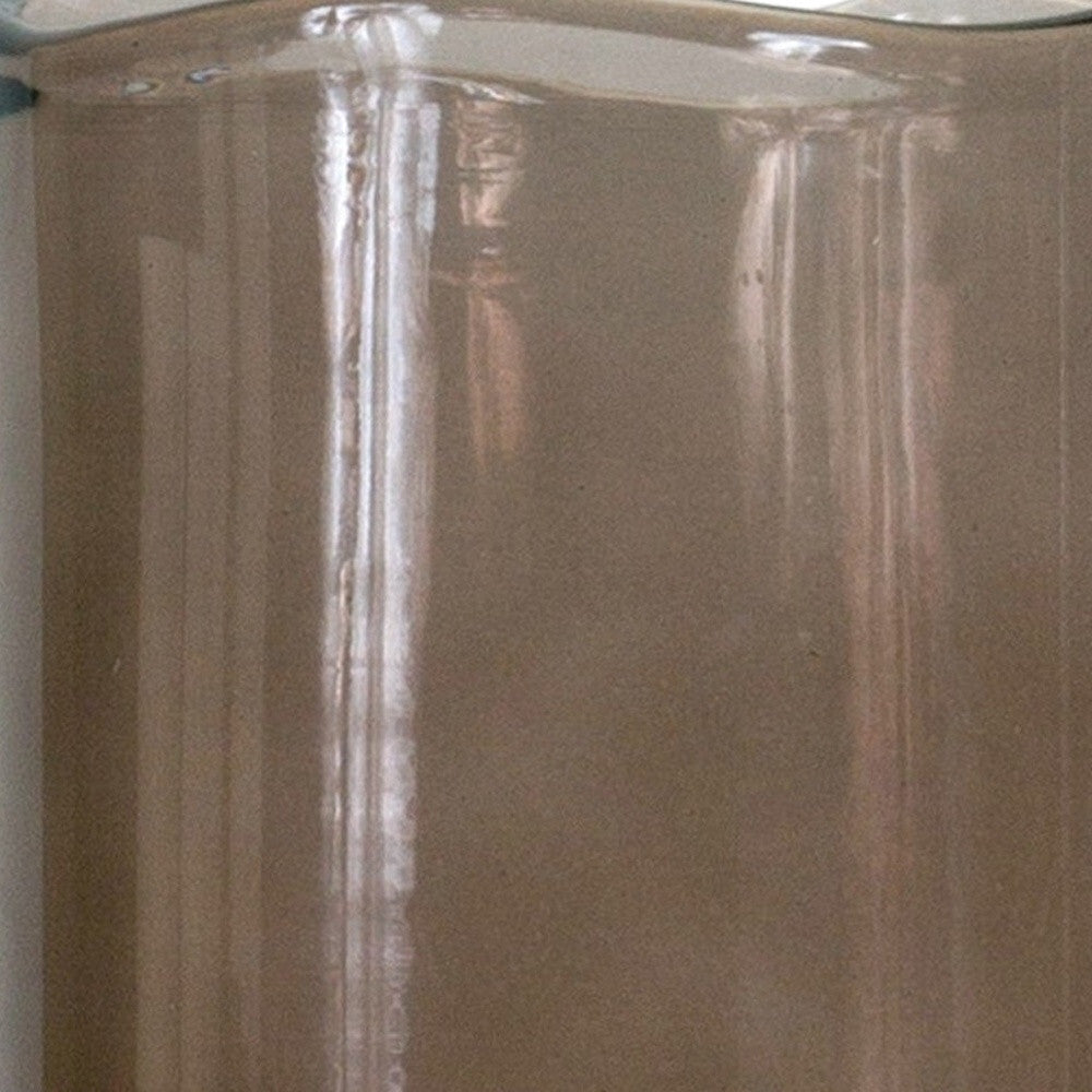 Brown cylinder glass vase detail showing contemporary design and warm earthy tone, versatile minimalist home accent
