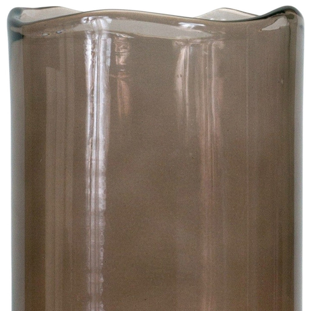 Compact brown glass table vase with modern cylinder silhouette, ideal for small spaces and intimate floral displays
