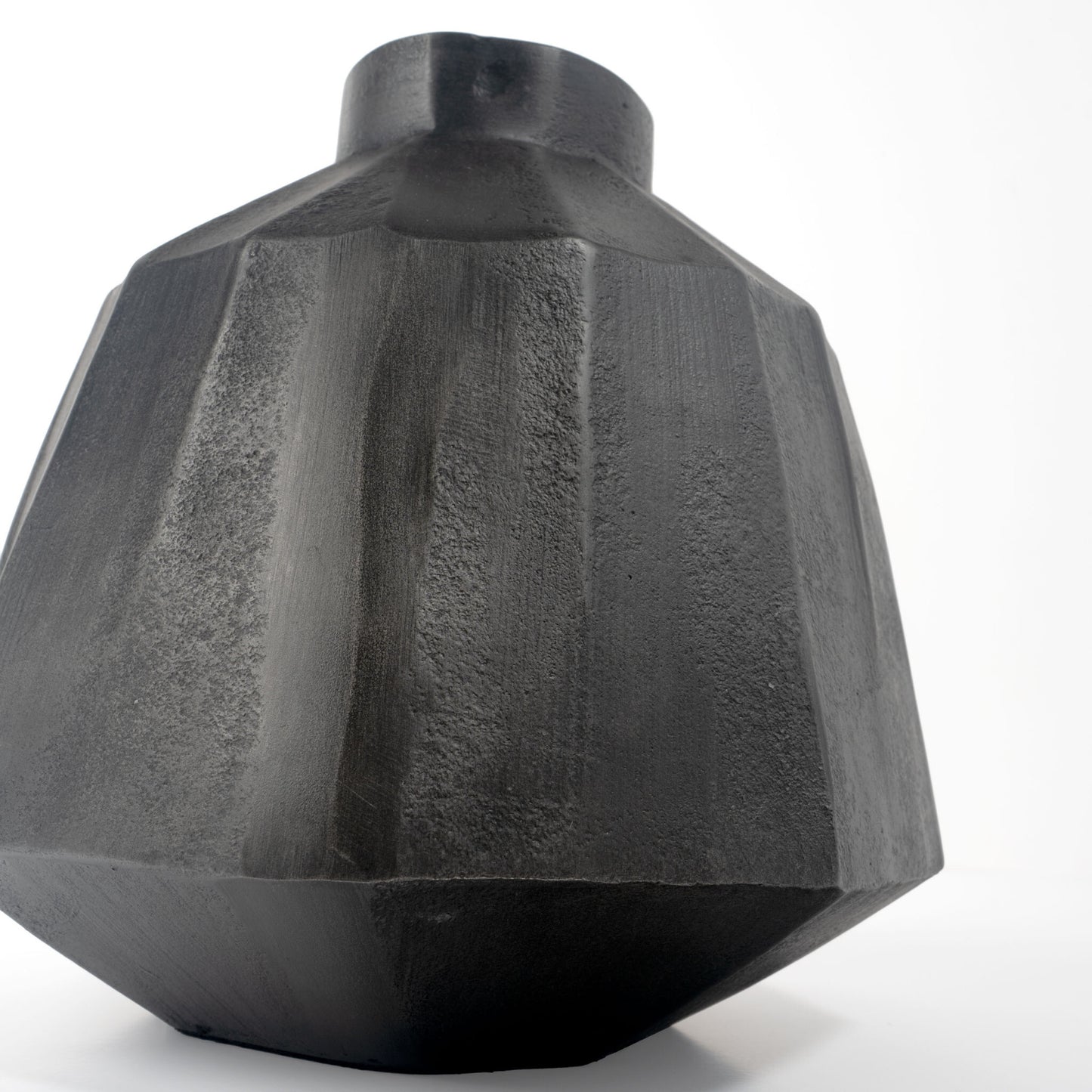 Contemporary gray geometric vase showing sculptural form, 11 inch aluminum table decoration