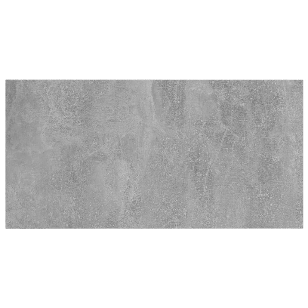 Close-up of concrete gray finish on modular bookshelf panel surface