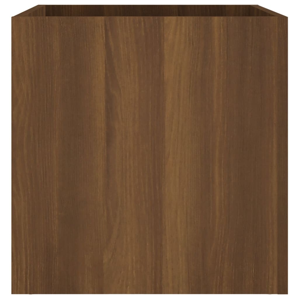 Close-up of brown oak planter box decorative inlays and textured surface - elegant indoor planter design