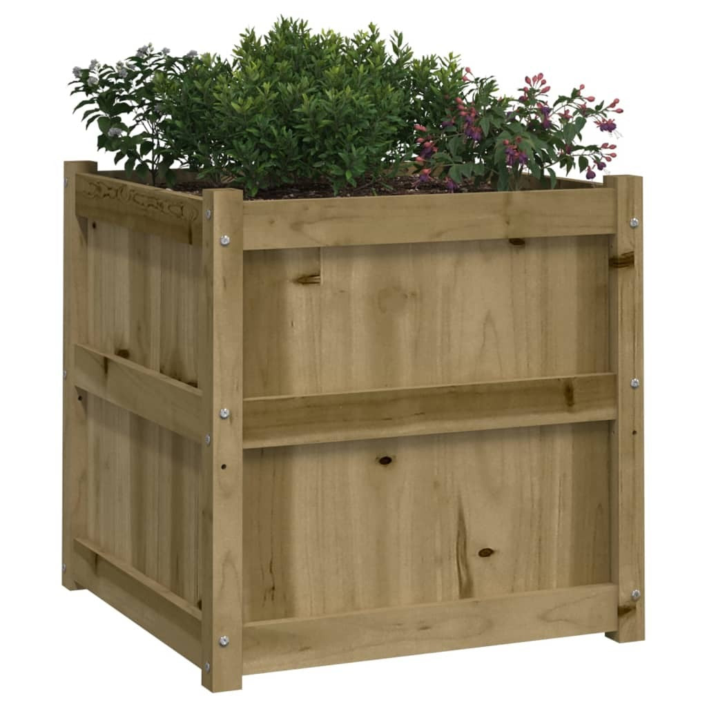 Square brown treated pine wood garden planter with plants in outdoor setting - weather-resistant raised bed