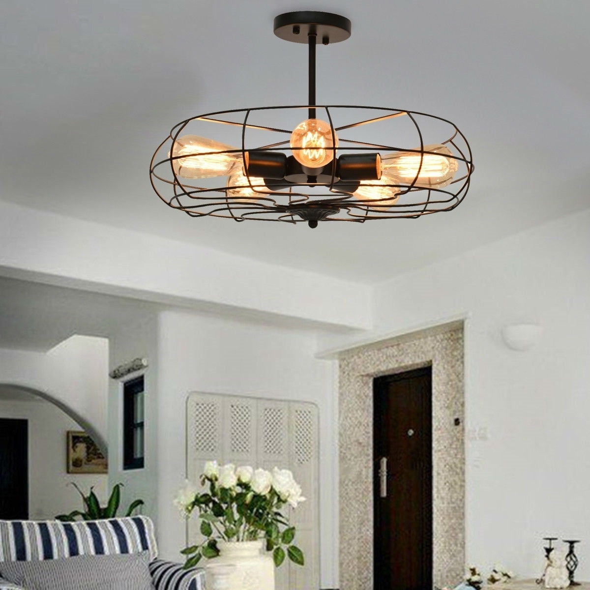 Close-up of black metal sphere chandelier showing vintage industrial open cage framework with 5 light sockets, rust-proof finish ideal for modern or farmhouse interiors