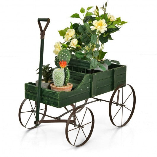 Empty green wooden garden cart showing interior space and wheel design