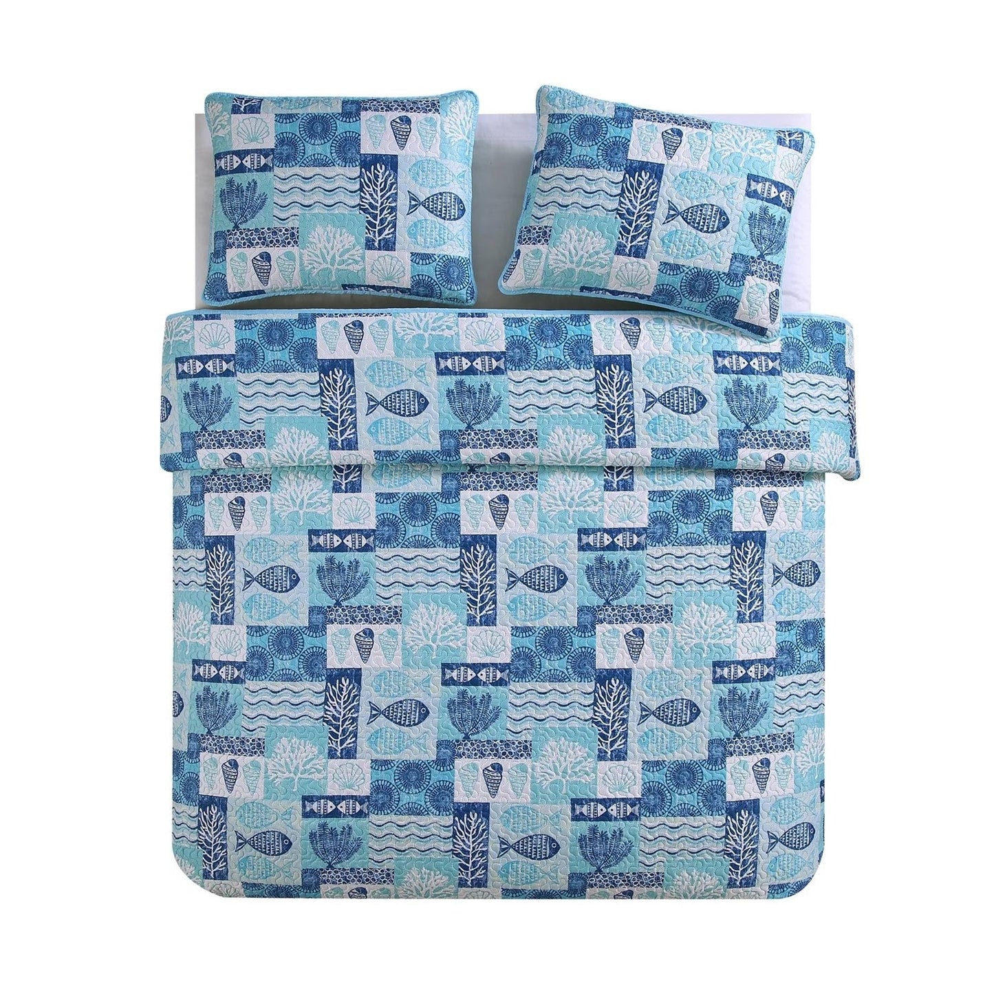 Close-up of aqua blue coastal quilt showing detailed sea life pattern and coral motifs