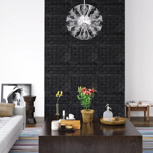 Living room with a black textured wall, decorative plants, and a chandelier.