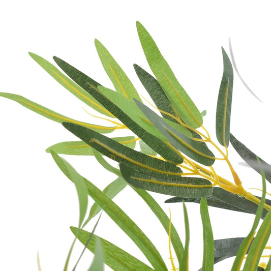 Close-up view of realistic faux bamboo tree leaves showing UV resistant green and brown artificial foliage details
