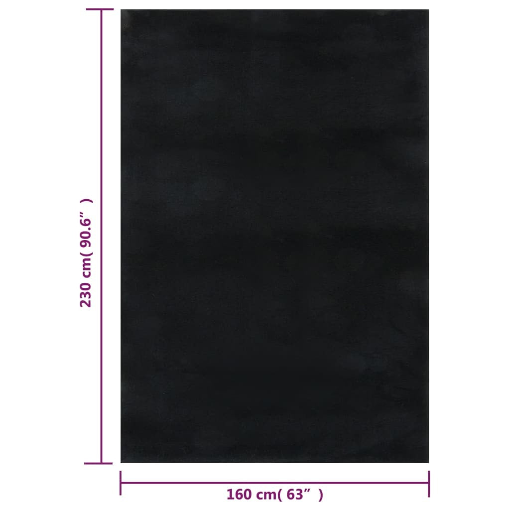 Black rectangular non-slip area rug product packaging and care instructions for home delivery
