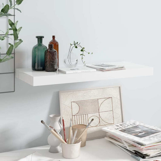 High gloss white floating wall shelf with single modern storage design

