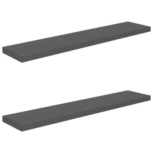 Grey floating wall shelves in modern bedroom interior with decorative items
