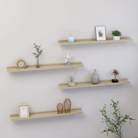 Set of 4 Sonoma oak floating wall shelves installed in living room displaying books and decorative items
