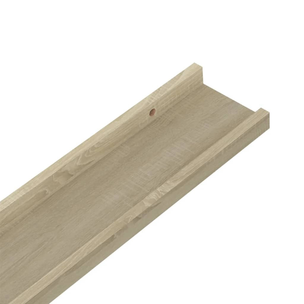 Set of 4 Sonoma oak floating shelves stacked showing brown wood grain pattern
