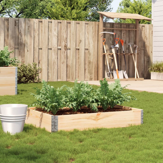 Rustic solid pine wood planter filled with plants in outdoor garden setting showing natural brown finish
