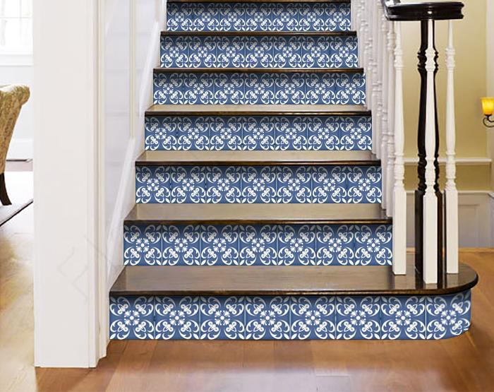 Wedgwood blue and white peel and stick tiles arranged in grid pattern showing installation layout
