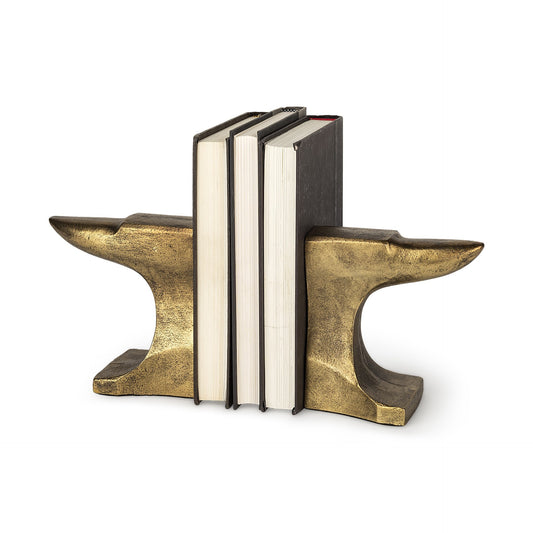 Close-up of distressed gold finish on anvil bookends showing authentic weathered patina and premium cast aluminum construction
