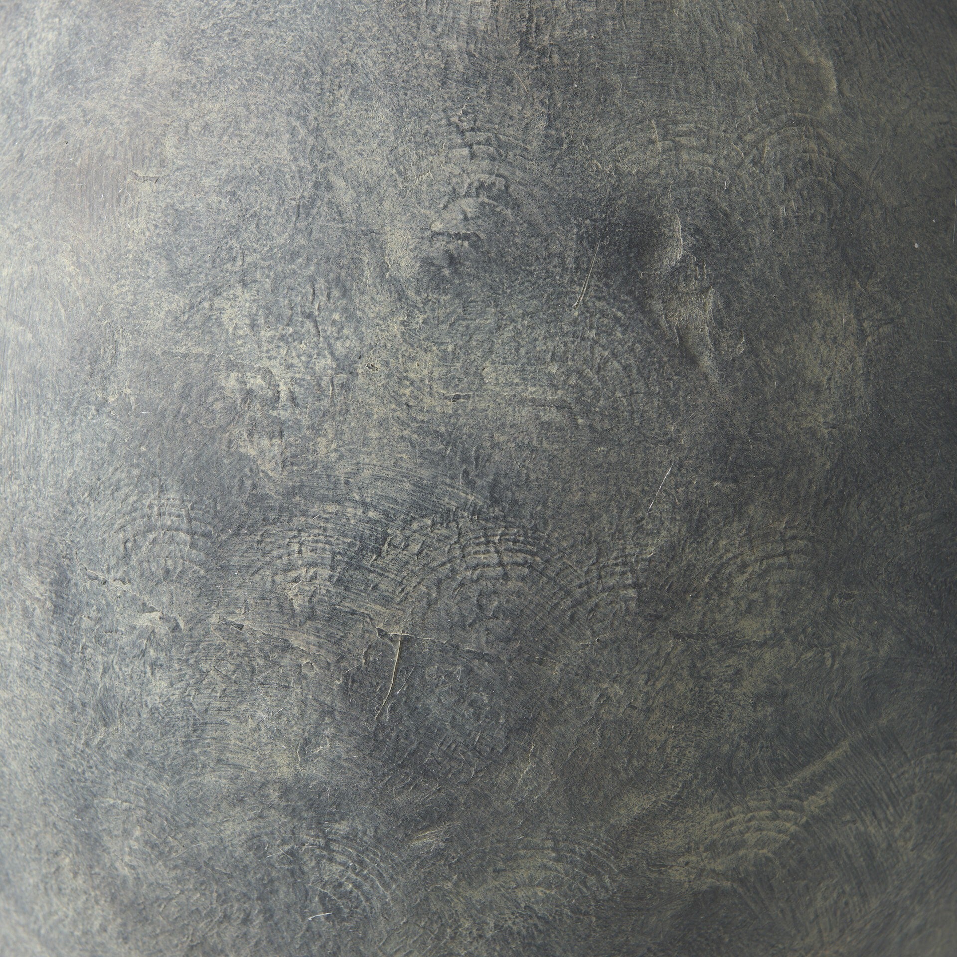 Earthy Kyros vase featuring matte gray finish and distressed texture perfect for casual modern interiors
