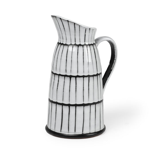 13 inch white and black artisan glaze ceramic pitcher with handcrafted color block design and dark clay edges for modern farmhouse decor
