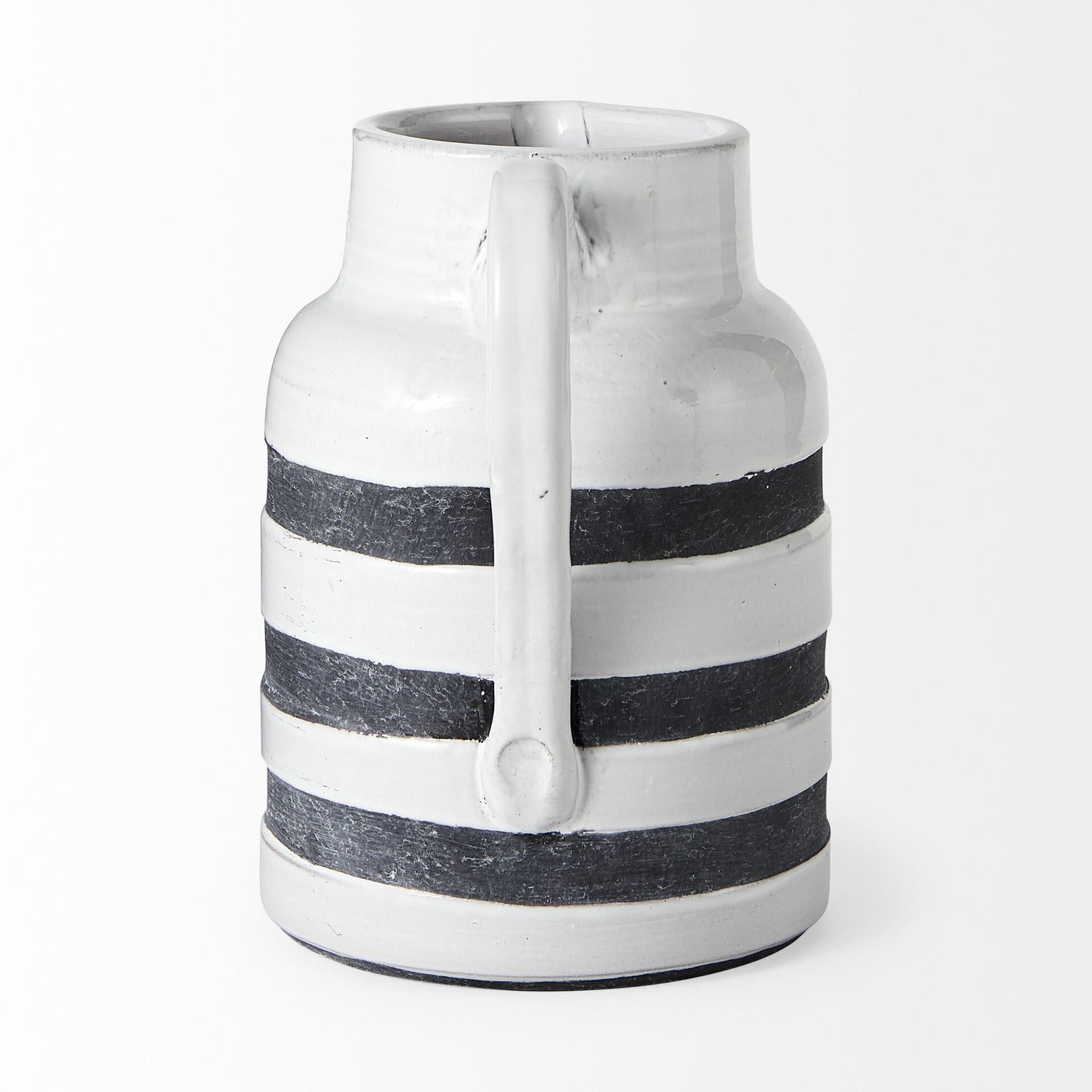 Vintage style ceramic jug showing weathered rustic finish and classic blue white stripe pattern

