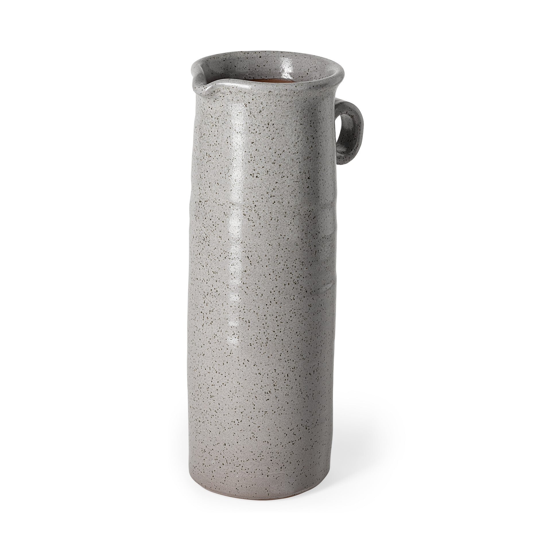 Side view of tall ceramic jug showing small loop handle and curved spout detail with gray speckled glaze

