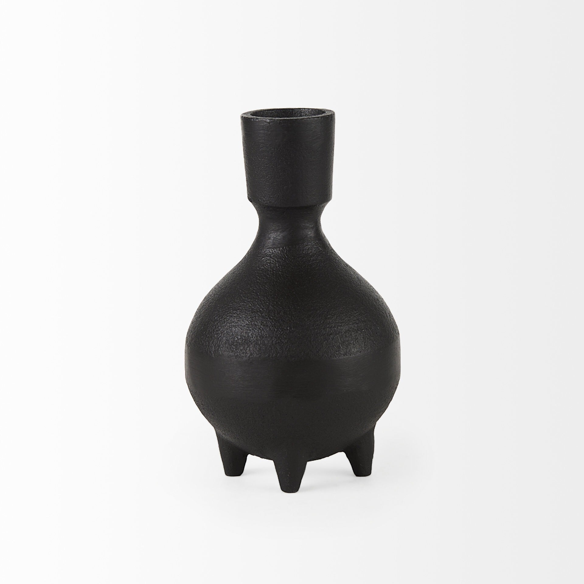 Rustic black ceramic pitcher vase close-up displaying matte finish and artisan-style distressing
