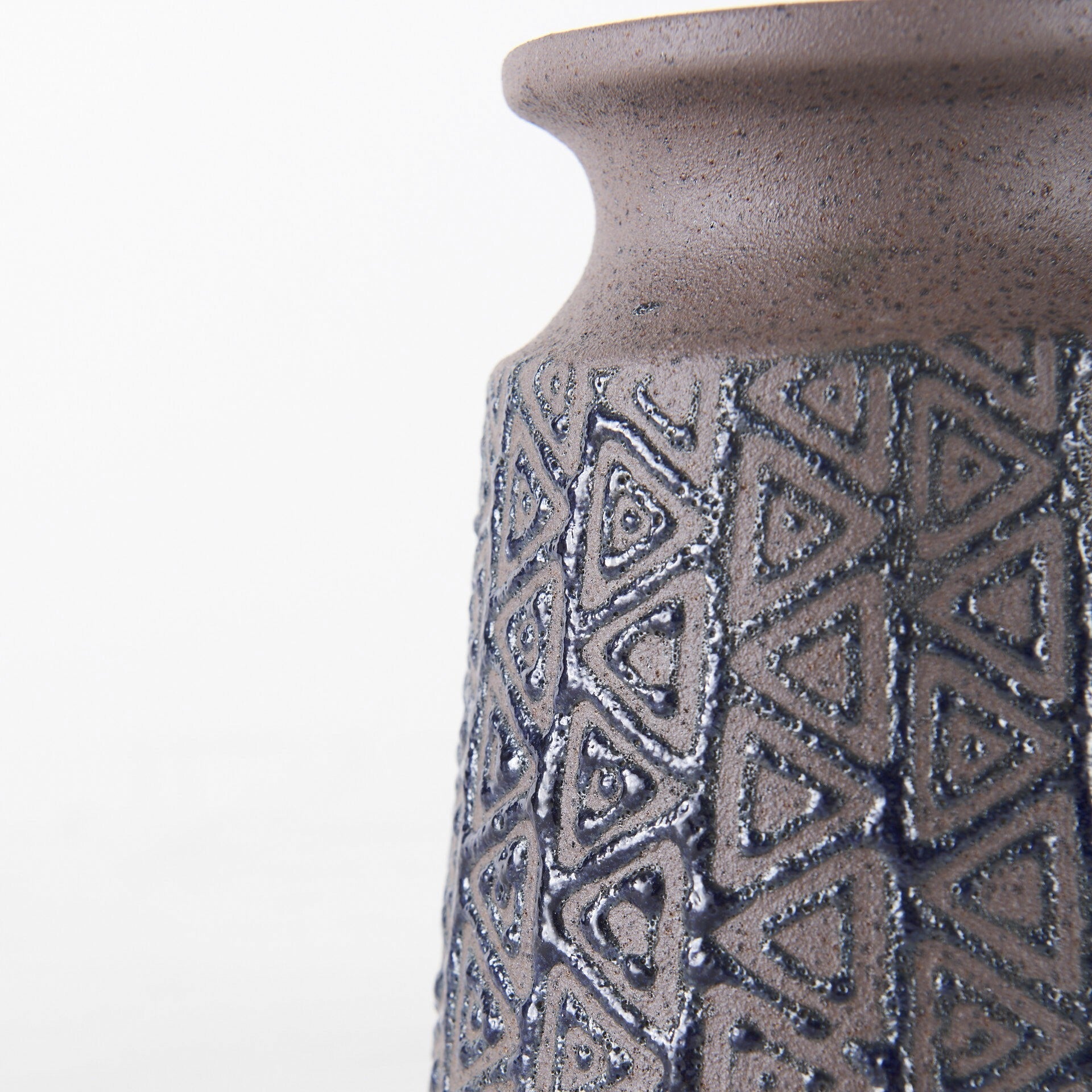 Small brown ceramic vase with tribal geometric design perfect for flowers or southwestern boho decor
