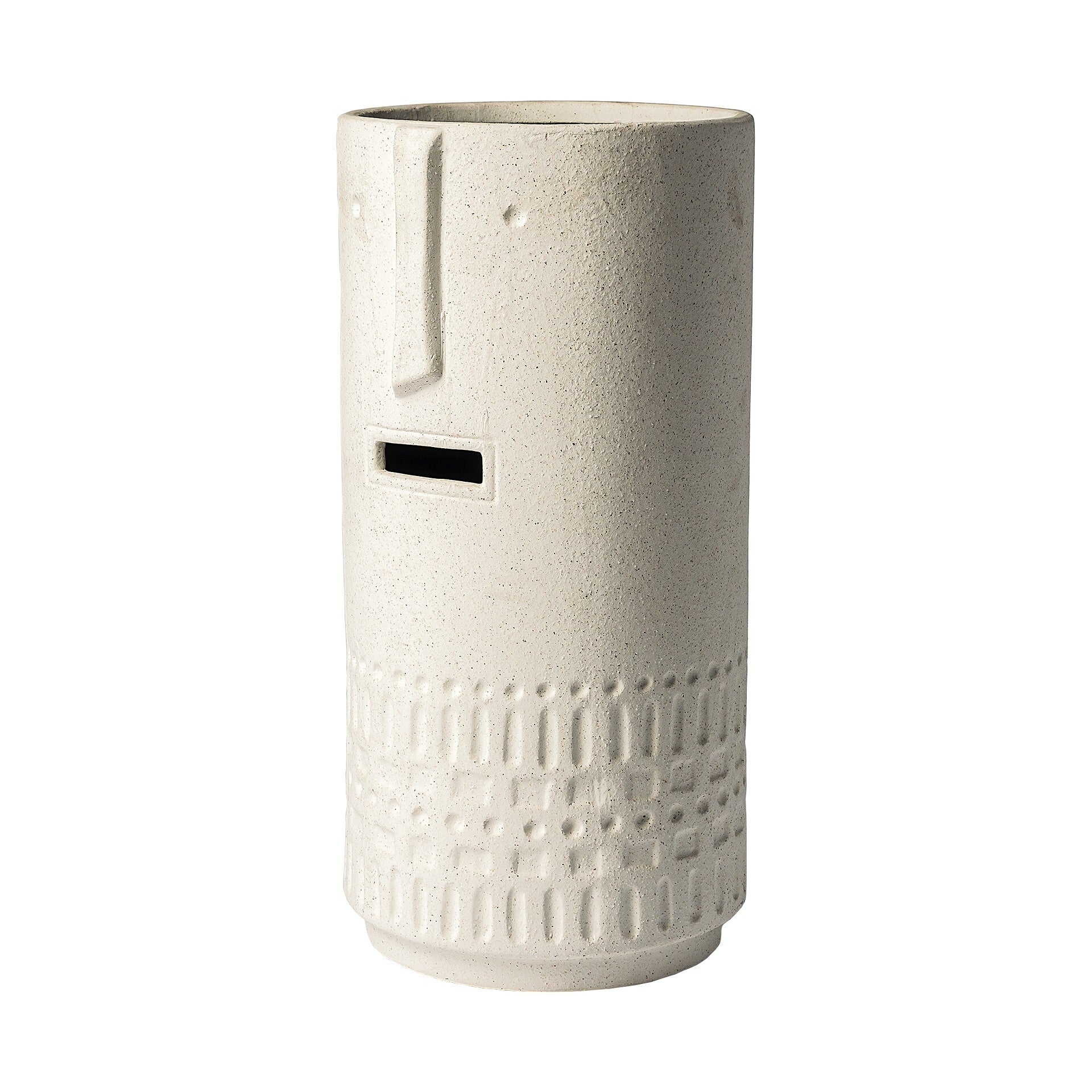 Side view of whimsical tribal vase showing textured beige finish and carved pattern details
