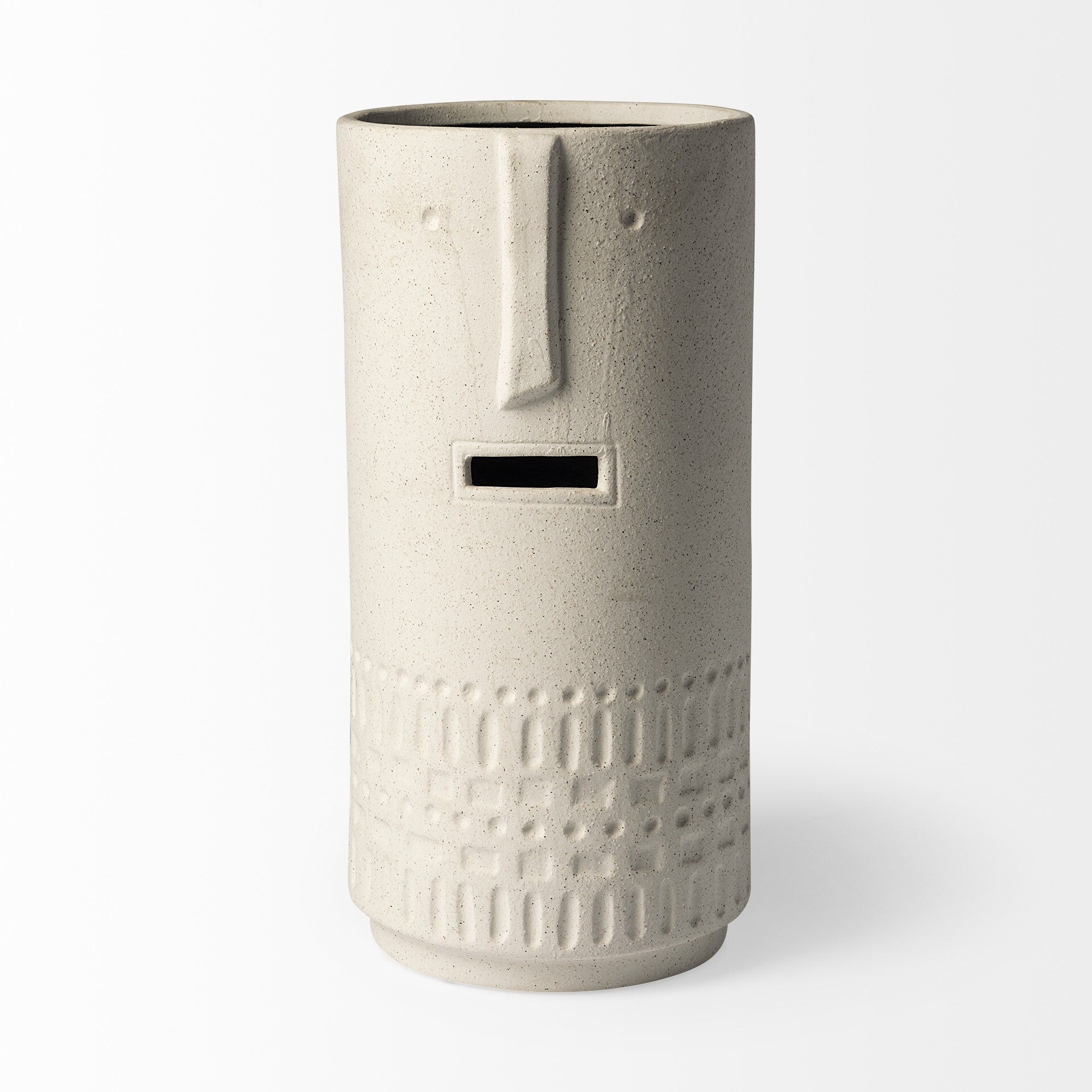 Close-up of smiling happy face design on bohemian ceramic vase with organic texture
