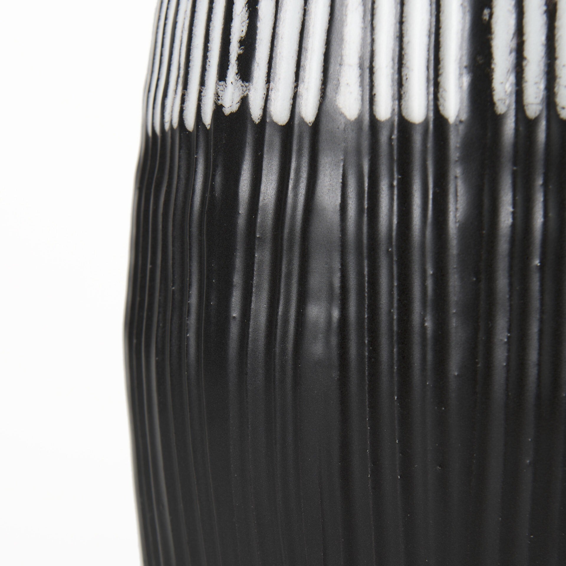 Full view of modern patterned ceramic vase displaying complete design from black glazed base to textured white top with gray striped details, versatile decorative accent
