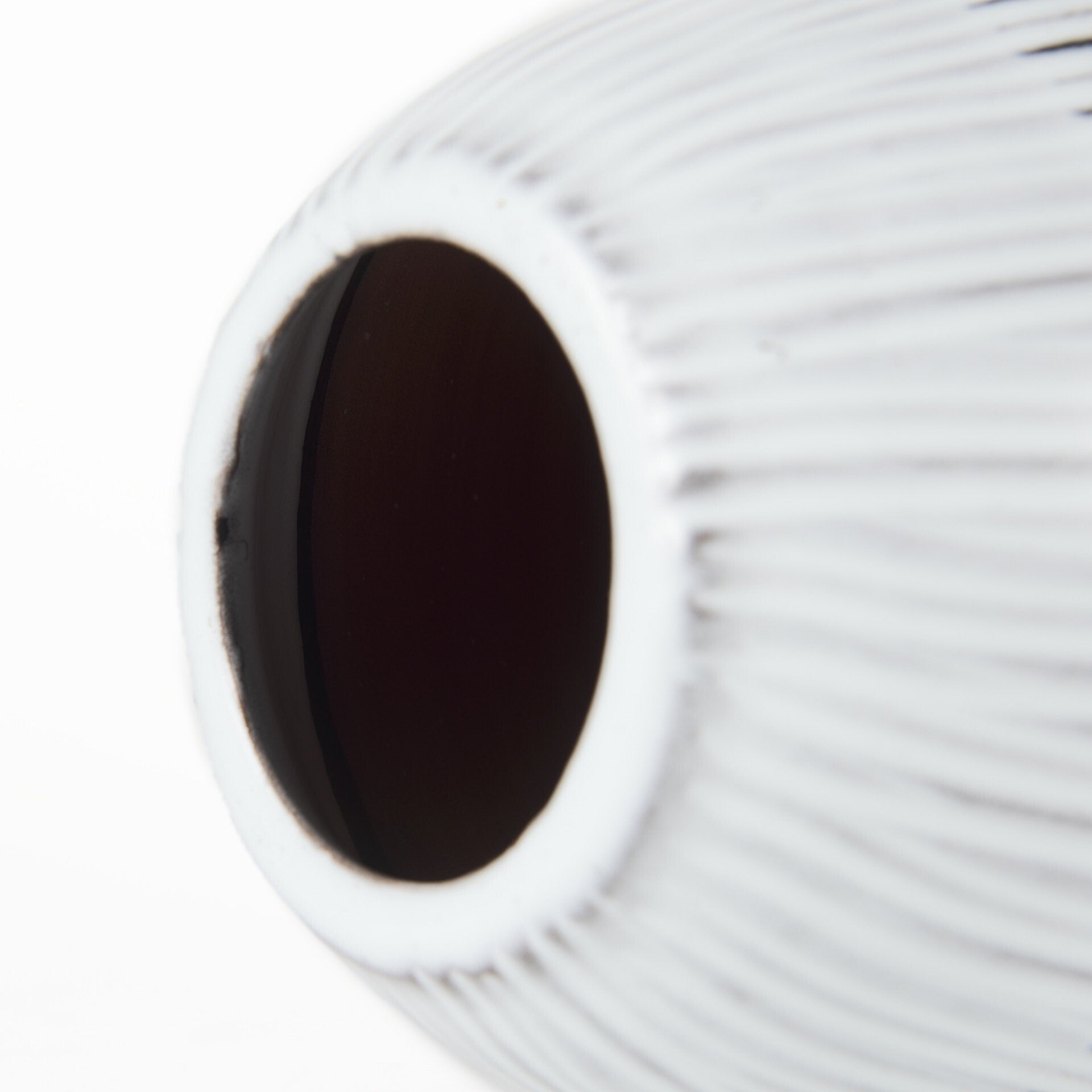 Textured striped ceramic vase showing complete 13 inch height and unique architectural pod design
