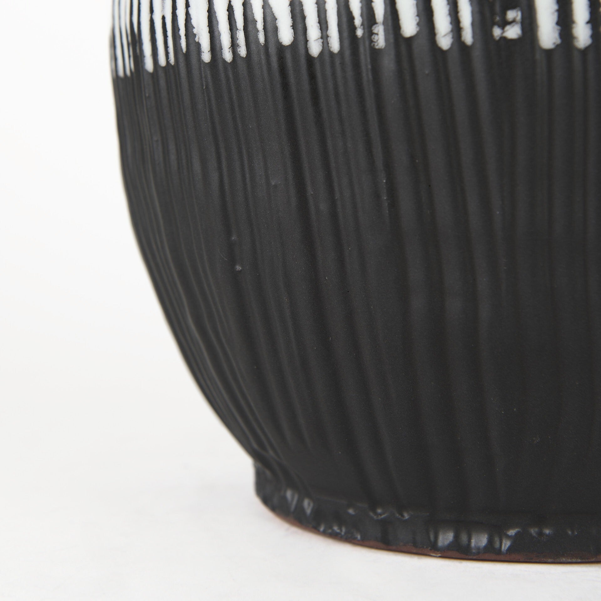 Contemporary black white ceramic vase full product view, modern statement piece for table or shelf decor
