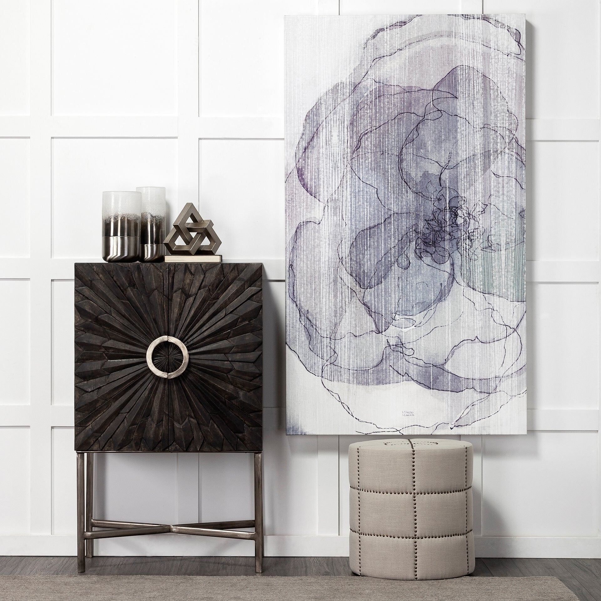 Brushed silver metal base vase displaying contrast between frosted glass and metallic finish
