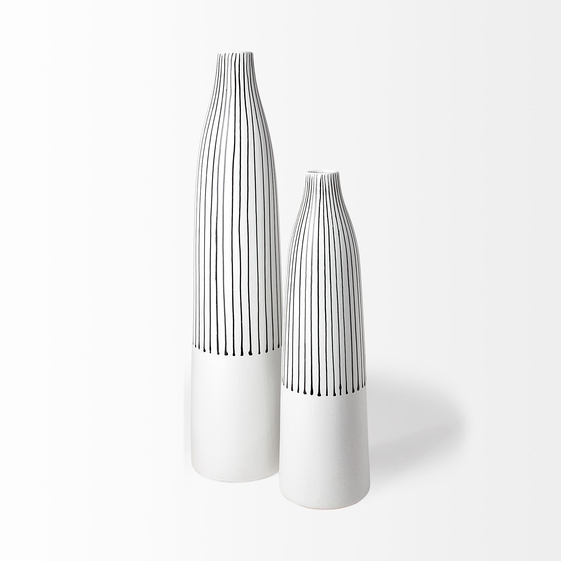 Side view of tall narrow black and white striped ceramic vase, perfect for single stem flowers
