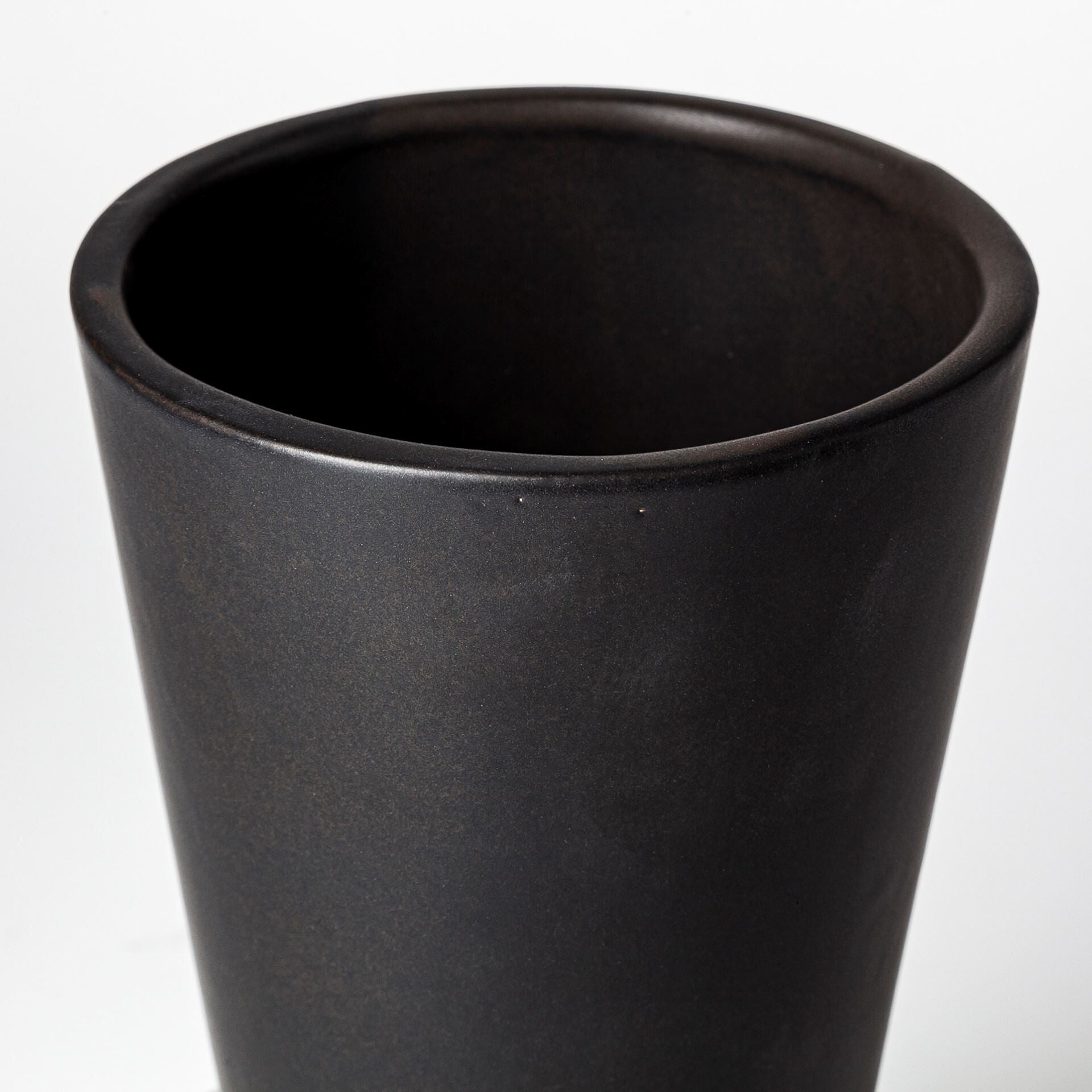 Contemporary black ceramic vase with matte surface, 9 inch modern home decor accent
