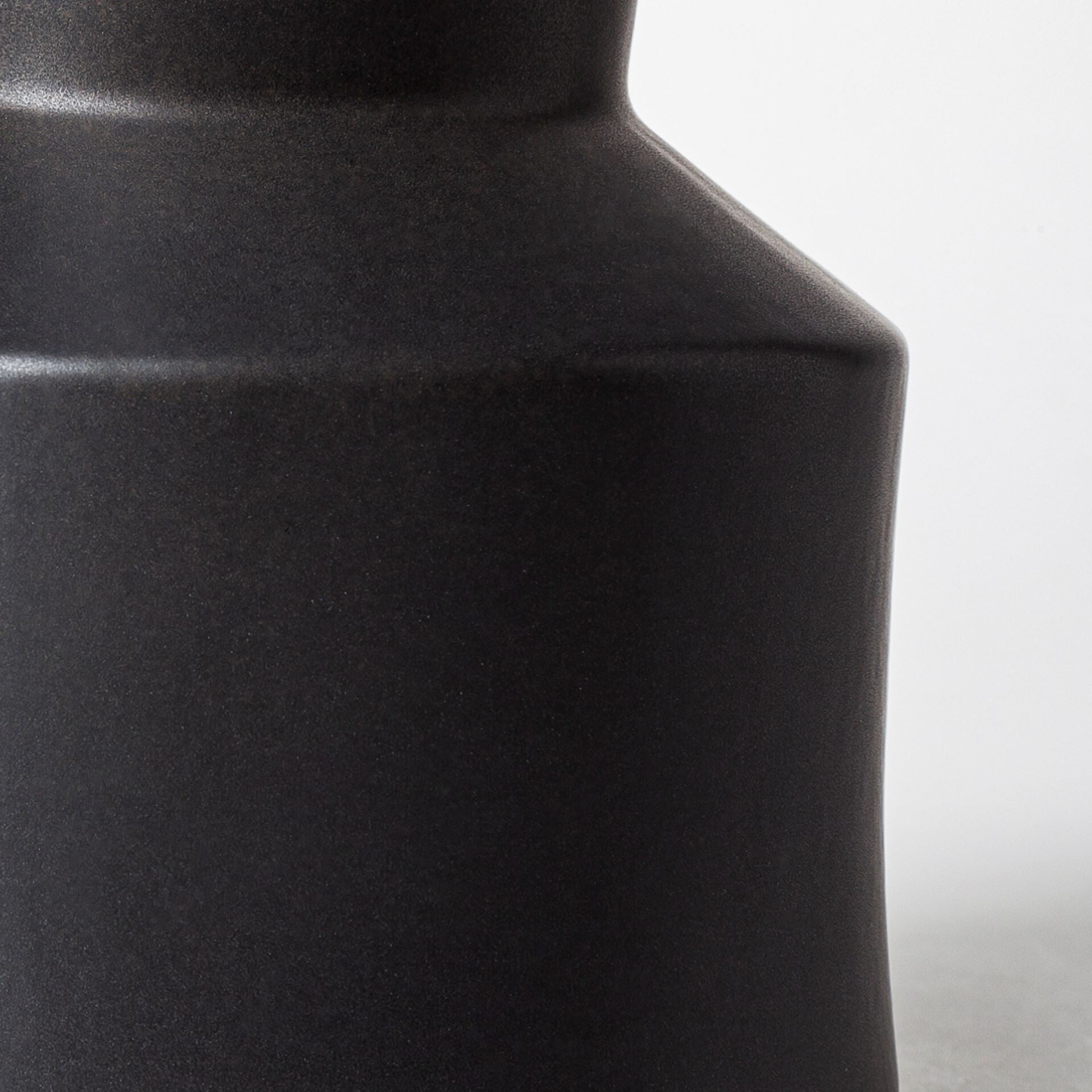 9 inch matte black ceramic vase showing deco style design, sophisticated modern decor
