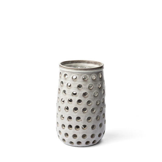 Elegant 12-inch white ceramic vase with organic translucent glaze and pierced dot pattern, featuring tall cylindrical shape with rounded base, perfect artisan home decor piece
