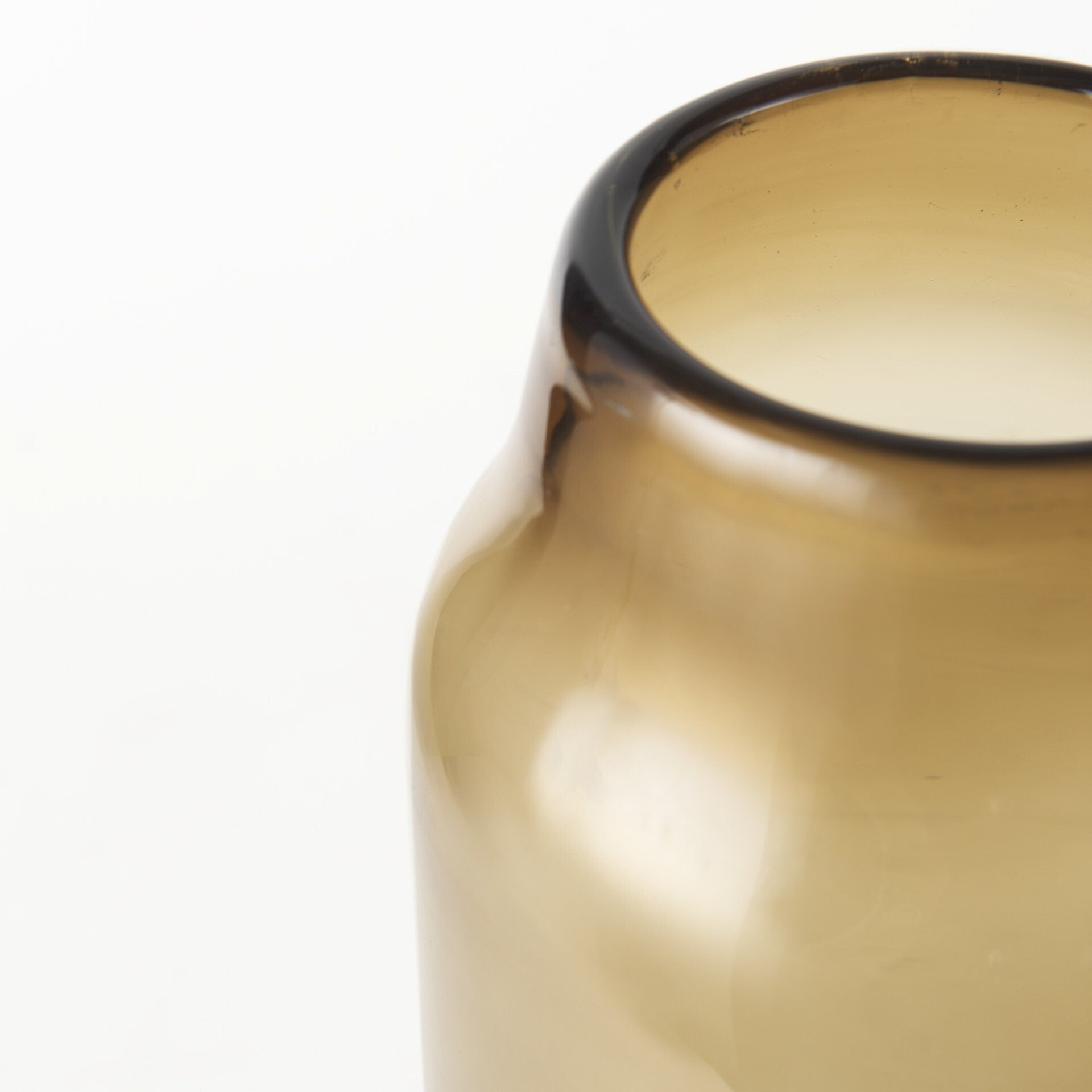 Antique look ombre brown vase on display, warm inviting centerpiece for rustic interiors
