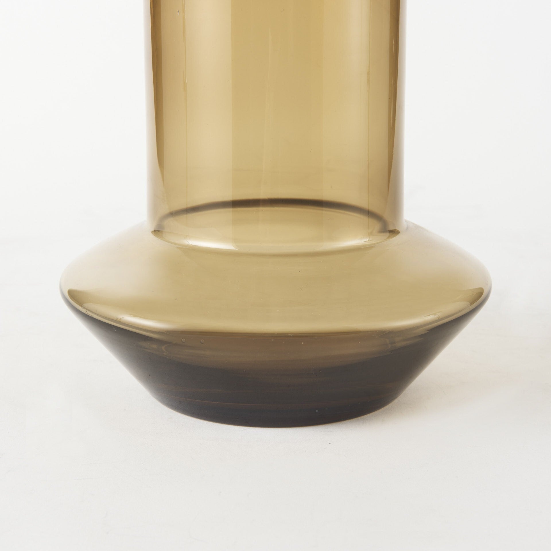 Vintage look brown glass vase featuring clean lines and neutral palette for versatile styling
